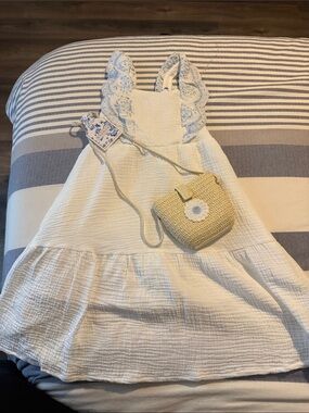btween White Cotton Dress with Blue Eyelet Straps and Straw Daisy Bag